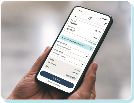 Hand holding a phone with app interface